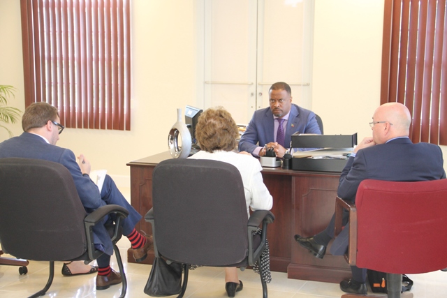 Hon. Mark Brantley, Deputy Premier of Nevis and Minister of Foreign Affairs in St. Kitts and Nevis in discussions with Baroness Joyce Anelay, Foreign Office Minister for the Overseas Territories in the United Kingdom and her team at his office at the Pinney’s Industrial Site on January 11, 2016